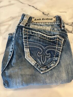 Rock Revival Women’s Distressed Blue Embroidered Pocket Boot Cut Jeans